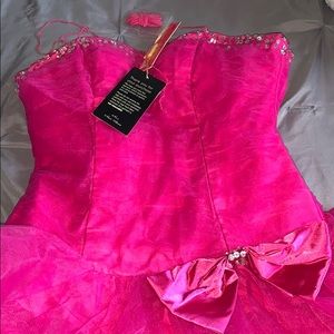 Hot pink short prom dress with pink bow on side